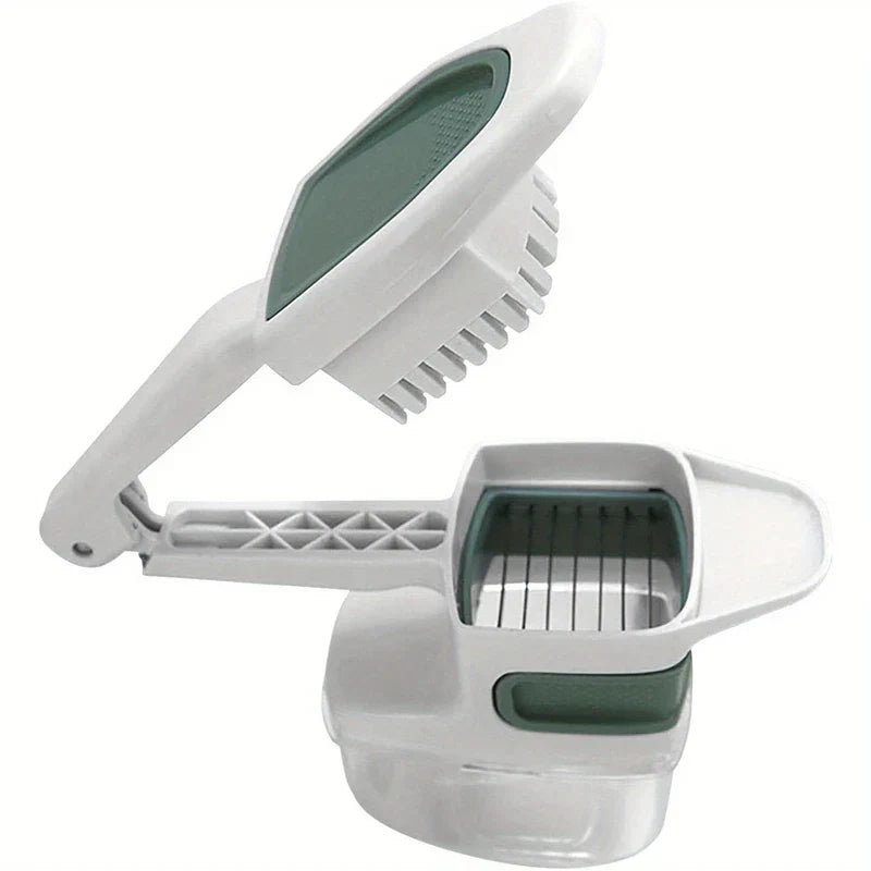 Vegetable Slicer - Open white and green hand-held prep tool with clear storage base on white background