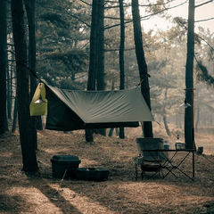 Lay-flat waterproof hammock , featuring insect netting and a rain fly.