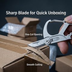 Edc Carabiner Keychain - Hand holding D-shape carabiner multi-tool with its blade extended cutting packing tape on a cardboard box