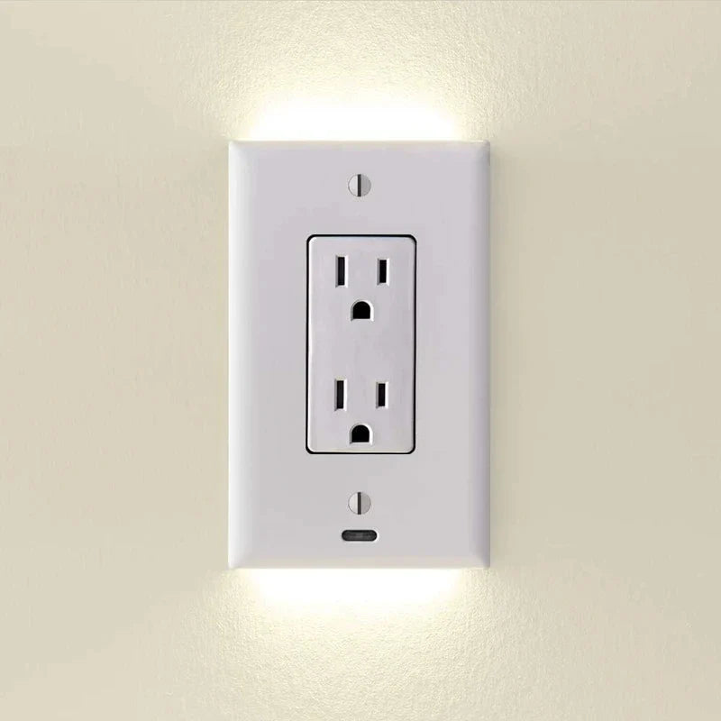 White wall electrical outlet with built-in LED night lights on beige wall