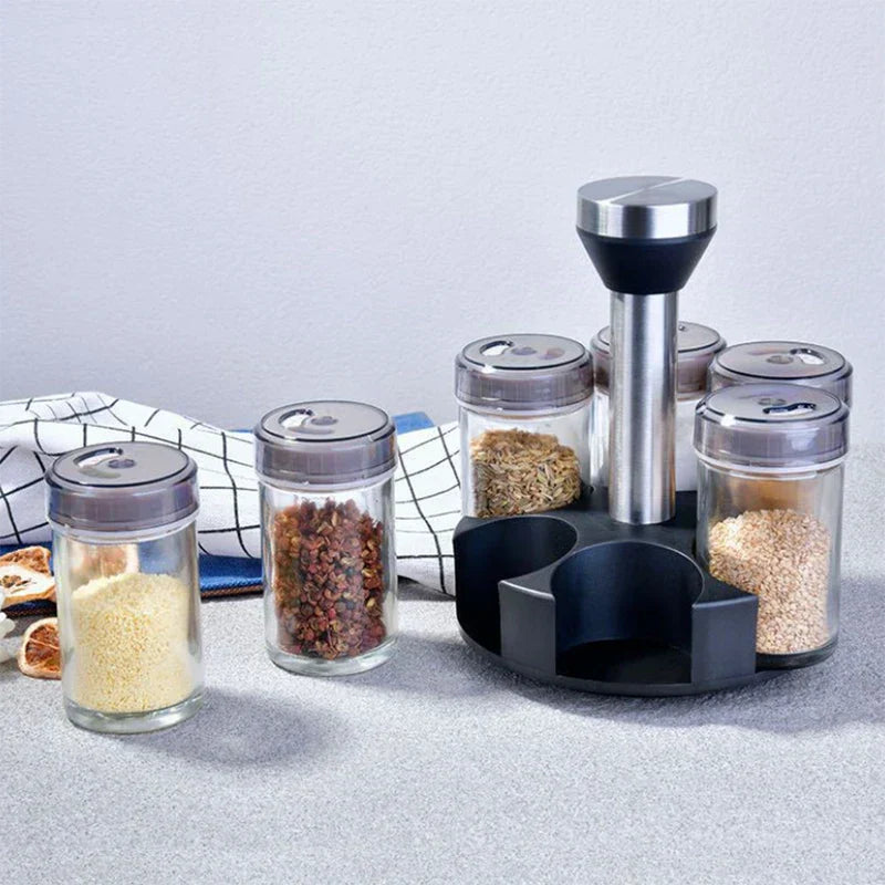 Rotating spice rack organizer with spices visible in clear jars
