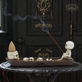 Skeleton ship backflow incense burner with cascading smoke effect