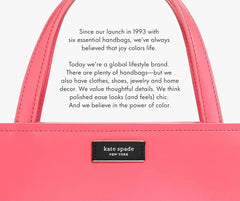 Pink Kate Spade handbag with brand tag and lifestyle brand description text