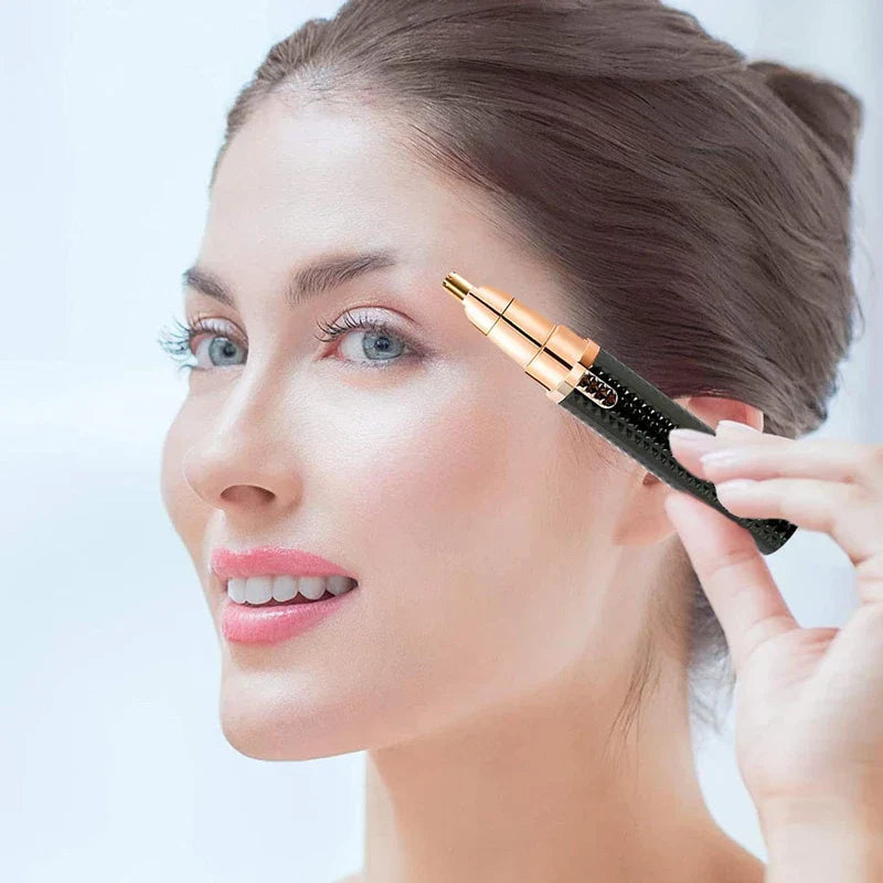 Woman using a rose gold and black electric shaver trimmer epilator kit near her eyebrow