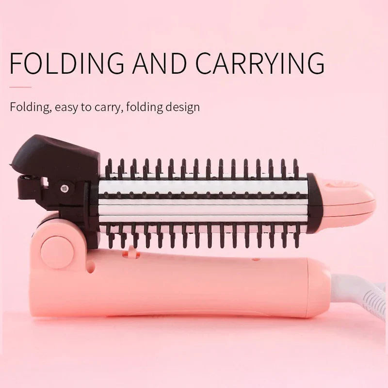 Hair Styling Tools - Folded pink electric hair styling brush laid horizontally on light pink background