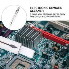White brush tool cleans a computer motherboard's heatsink area, and a circular inset shows a multi-cleaner; the keyboard cleaning brush is visibly present as a cleaning brush for electronics.