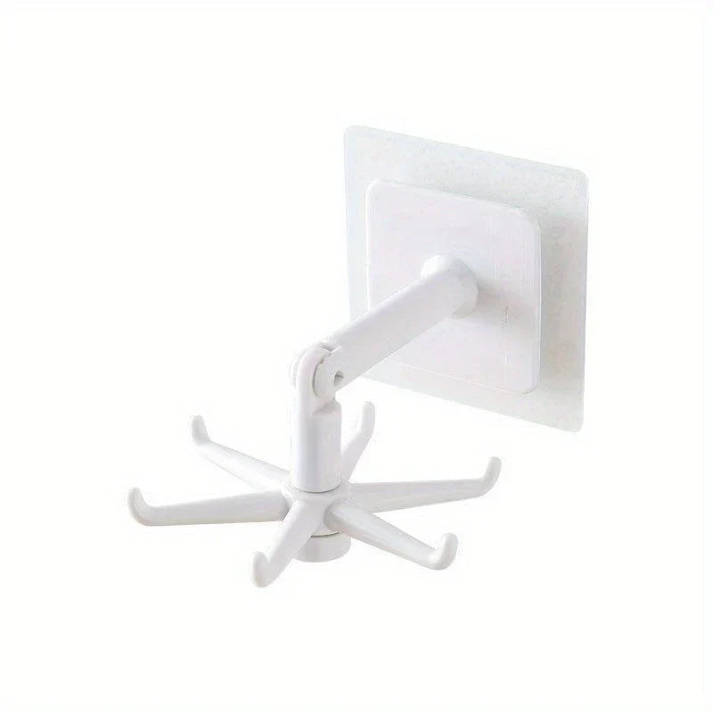 Adhesive Utensil Holder Hooks - White adhesive wall-mounted hook with a 6-prong rotating hook assembly and adjustable articulated arm, on a white background