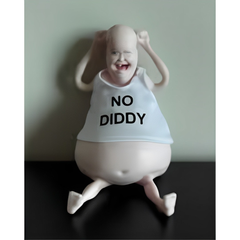 Gremlin Desk Buddy - Chubby bald figurine wearing a white tank top sits with both arms raised behind its head, facing forward