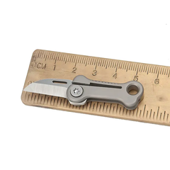 Mini Bone Shape Folding Knife – Titanium Alloy EDC Pocket Tool Keychain