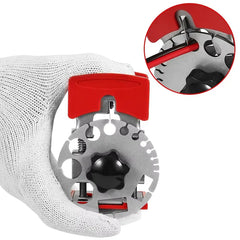 Handheld Wire Quick Stripper - A gloved hand holding a red and silver hand tool with a close-up inset of its blade acting on a red rod