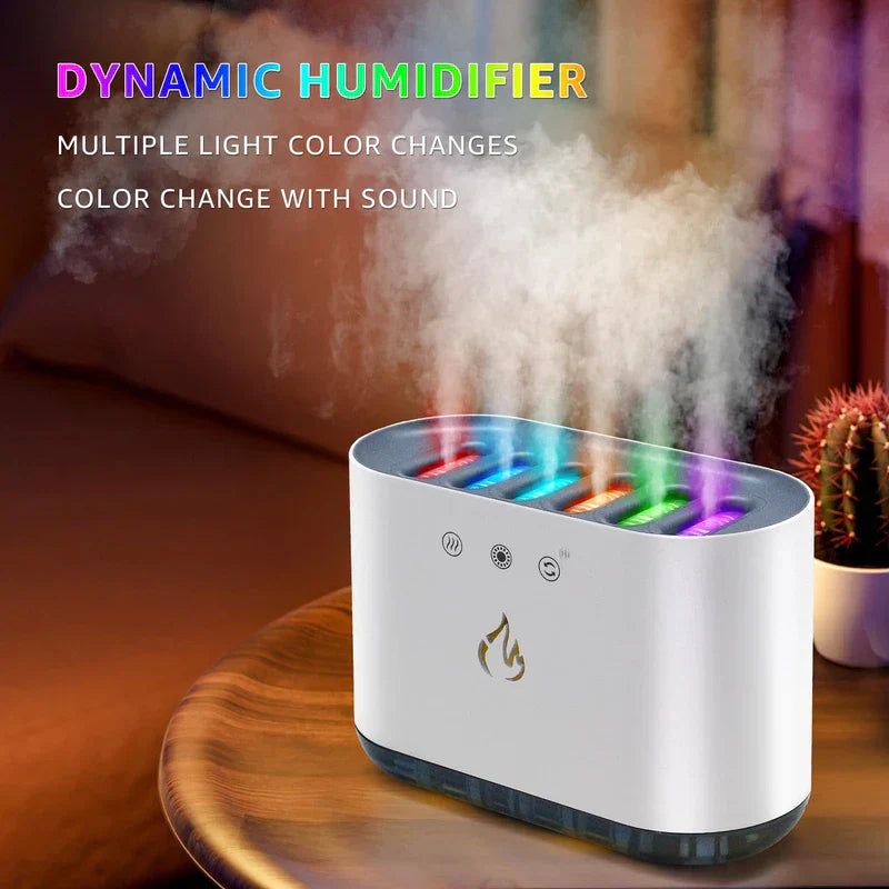 Cool Mist Humidifier - White humidifier with six colorful mist streams sits on a wooden round table beside a small cactus, with colorful text above it.