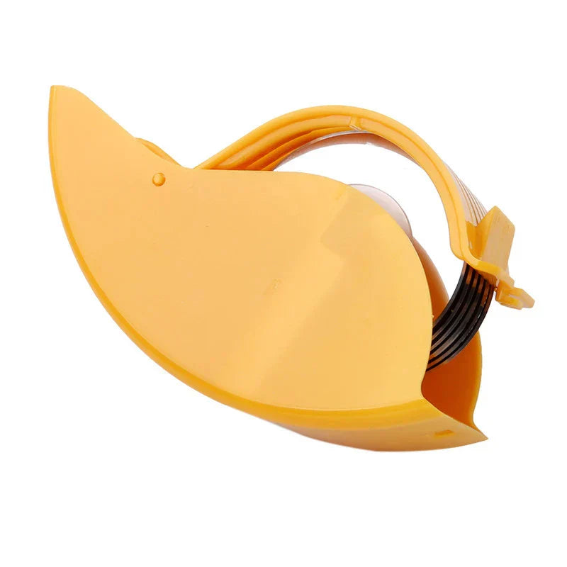 Pizza Dough Cutter Slicer - Yellow curved vegetable slicer in closed side view, showing outer plastic shell and partial blade stack, on a white background.