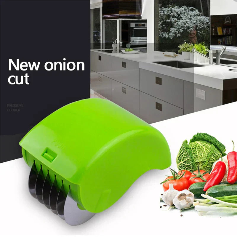 Pizza Dough Cutter Slicer - Green handheld vegetable slicer with multiple curved blades, set against a modern kitchen background with a pile of fresh vegetables on the right.