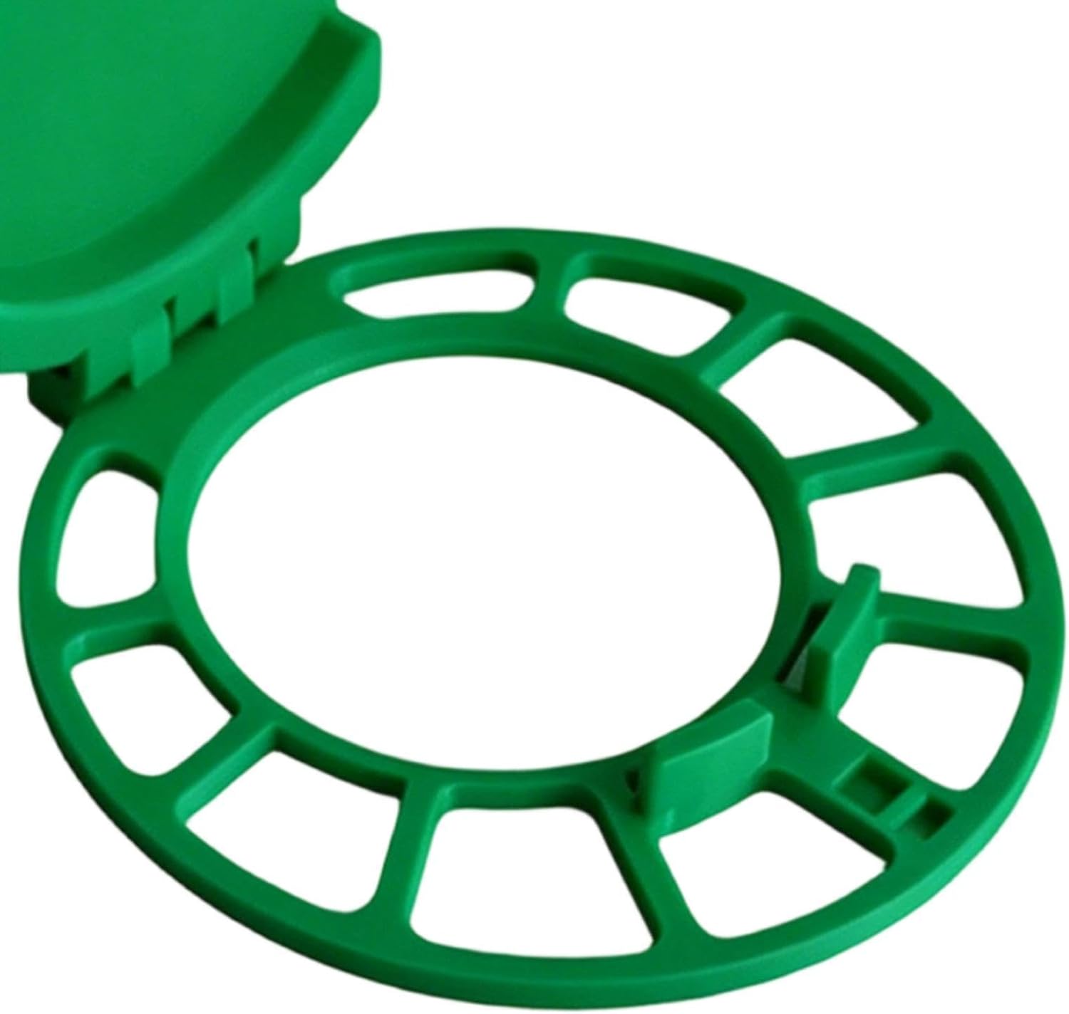 Organizer Shelf - Close-up view of the lower slotted ring portion of a green plastic folding cup holder, showing inner retention tabs.