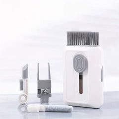 kit de limpieza para electrónica - Juego completo de herramientas de limpieza dispuestas junto al estuche de almacenamiento blanco