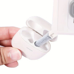 Electronics Cleaning Kit - A hand holds a white earbud case as a white cleaning tool with a fuzzy tip cleans inside the case.