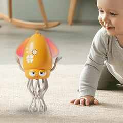 Dancing Octopus Musical Toy - Baby crawls on a carpet facing a yellow squid toy with illuminated side panels.