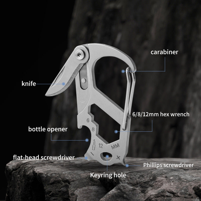 Edc Carabiner Keychain - D-shape carabiner multi-tool with labeled feature points resting on a dark rough stone surface