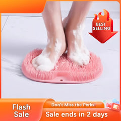 Pair of soapy feet standing on a pink silicone shower foot scrubber mat with flash sale graphics