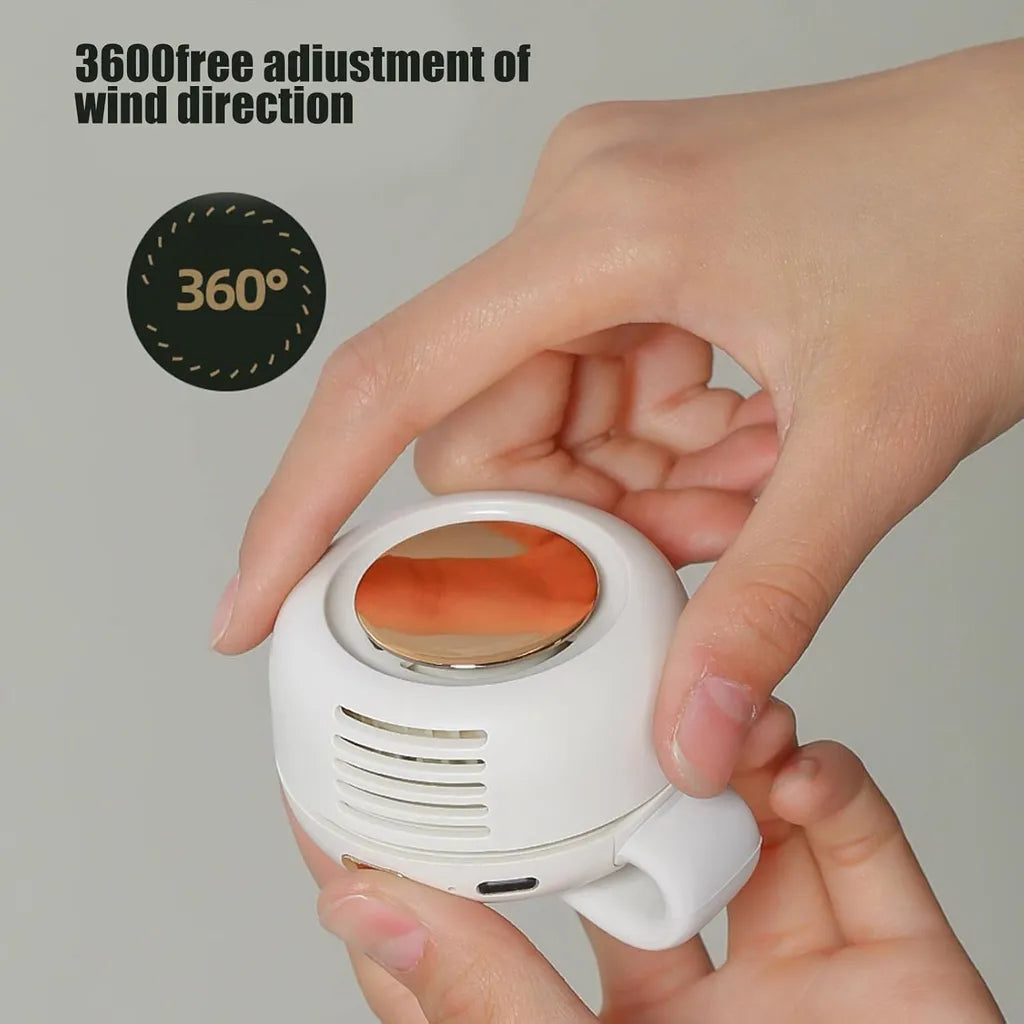 Hand adjusting 360° wind direction on white portable bladeless fan