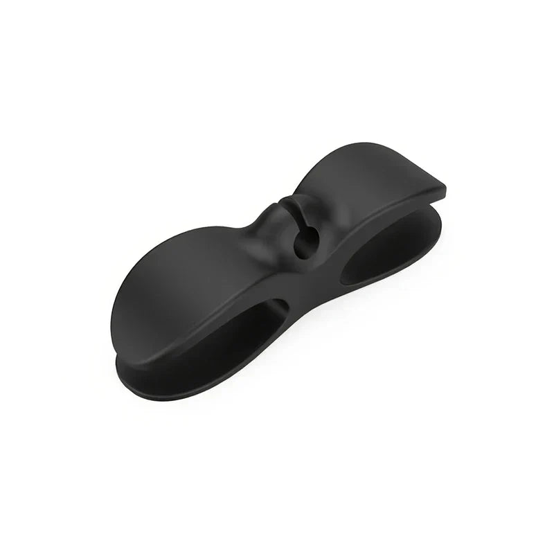 Adhesive Cable Management Clips - Black matte bow-shaped cord clip on white background