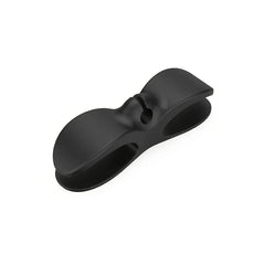Adhesive Cable Management Clips - Black matte bow-shaped cord clip on white background