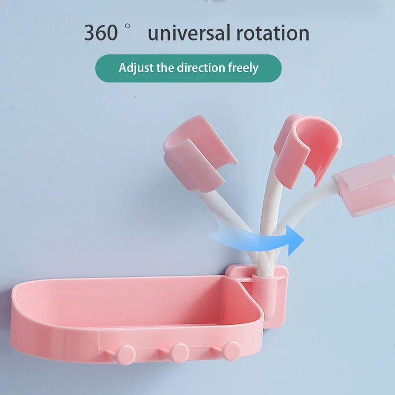 Shower Head Holder - Pink soap dish with three hooks and an adjustable arm that rotates 360 degrees, against a light blue background