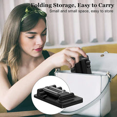 Mobile Device Desk Stand - Woman placing a folded black device into a white handbag, with a close-up inset of the folded device
