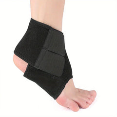 Ankle Support Brace - Black adjustable wrap worn on a right foot, side view with open heel design