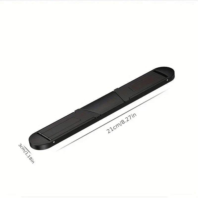 Portable Laptop Stand - Black elongated folding device displayed with dimension labels: 21cm/8.27in length, 3cm/1.18in width, on white background