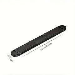 Portable Laptop Stand - Black elongated folding device displayed with dimension labels: 21cm/8.27in length, 3cm/1.18in width, on white background