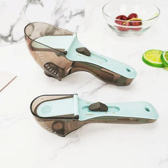 Adjustable measuring spoon with easy-slide mechanism in kitchen drawer
