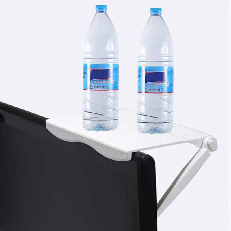 Adjustable Monitor Stand Riser - White screen top shelf mounted on a monitor edge, holding two full large water bottles