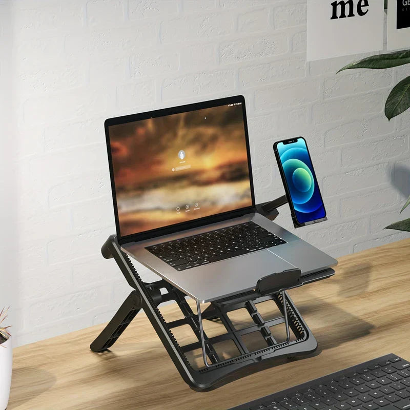 Tablet Desk Mount Stand - Elevated stand holding a laptop and smartphone on a wooden desk against a white brick wall