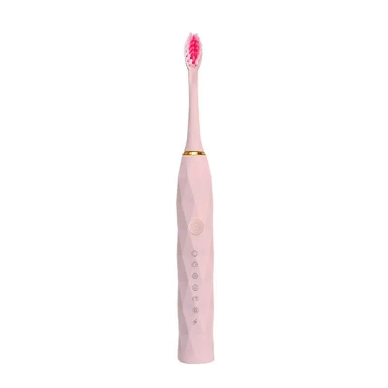 Toothbrush Kit - Single light pink electric toothbrush with pink brush head and gold accent ring on white background