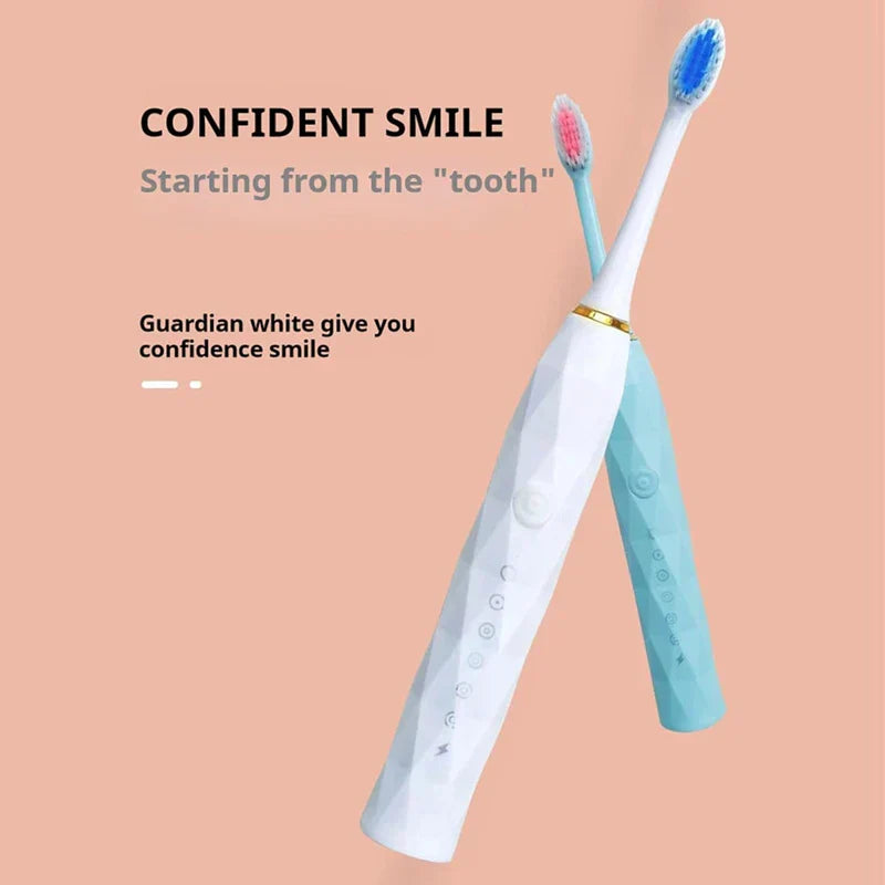 Toothbrush Kit - Two electric toothbrushes (white and light blue) crossed on a peach background with confident smile text