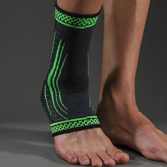 Black green compression ankle brace support worn on foot for sports
