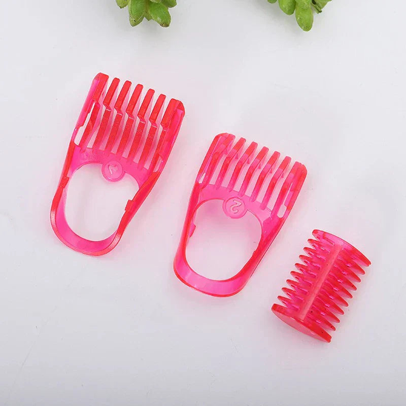 Facial Tool - Three translucent pink hair clipper guards of different sizes on a white surface, small green plant buds at top