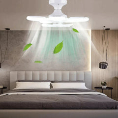 Bright ceiling light fixture installed above a bed in a modern bedroom, with illustrated air flow and floating leaves.
