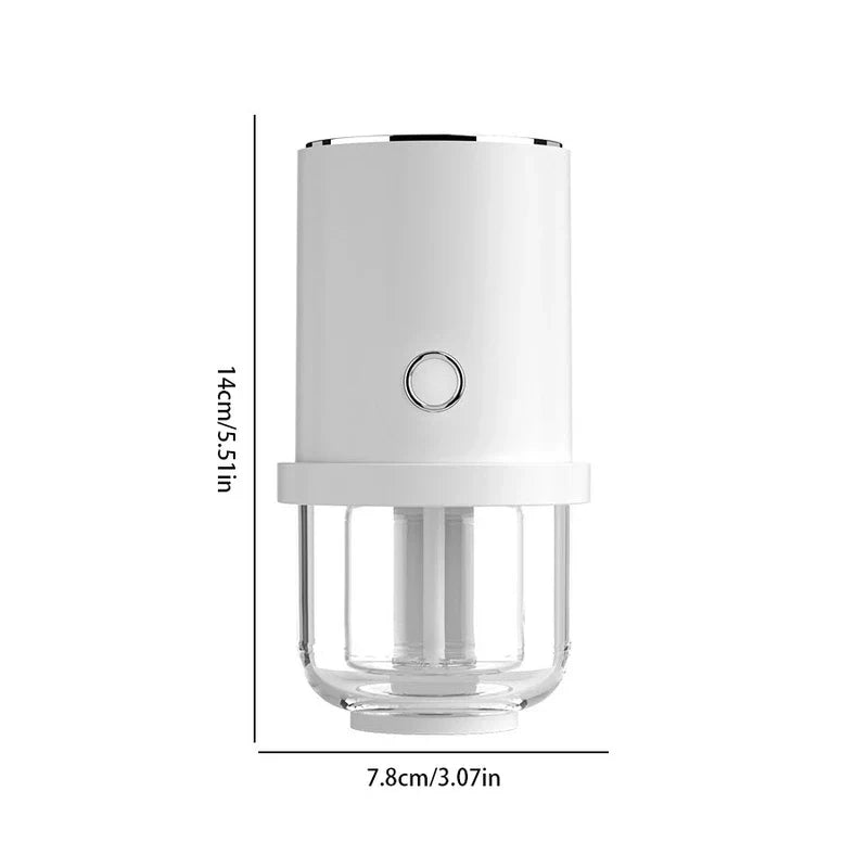 humidificador - dispositivo cilíndrico blanco y transparente con un botón circular frontal, altura marcada 14 cm, ancho marcado 7,8 cm