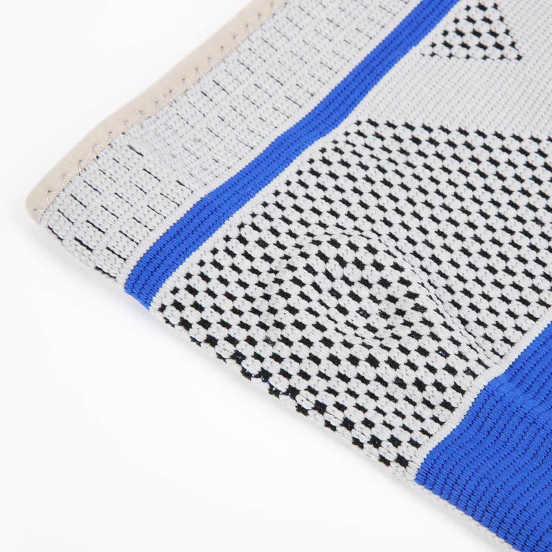 Knee Support Sleeve - Close-up of the top edge of a knit knee sleeve showing stitching and patterned fabric