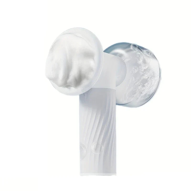 Automatic Foaming Pet Bath Brush Dispenser - White double-sided grooming tool with foam on one brush head and clear reservoir on the other