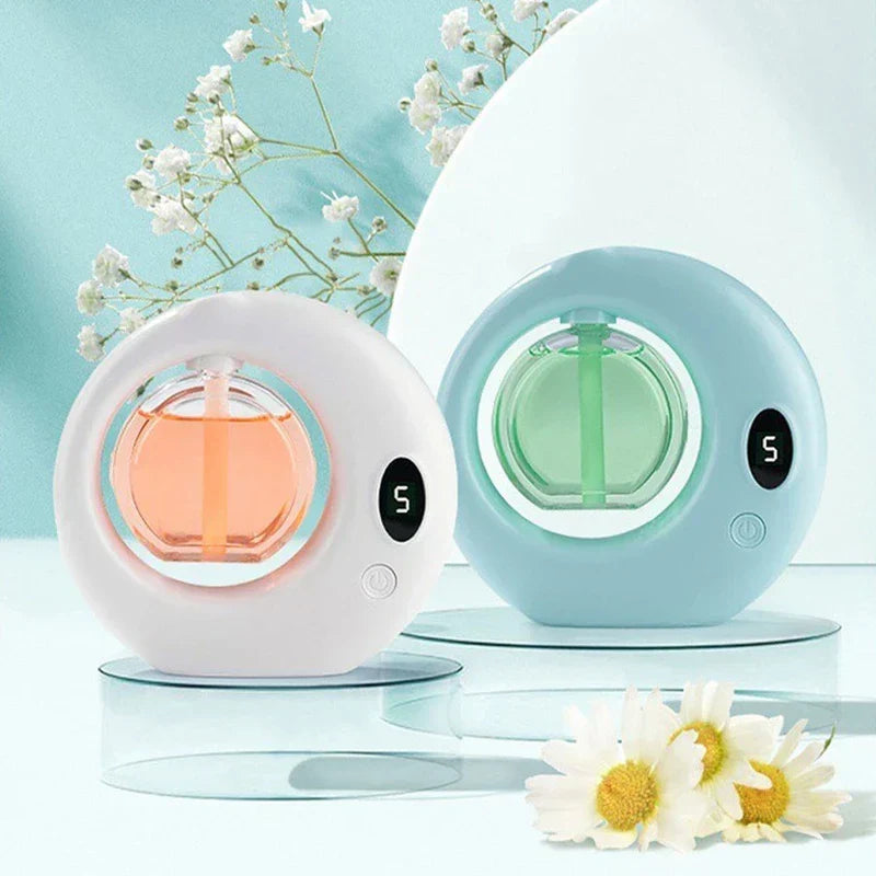 Aerosol Air Freshener Dispenser - Two aerosol air freshener dispensers (pink, teal) with digital displays on glass stands, near white and daisy flowers on a light blue background