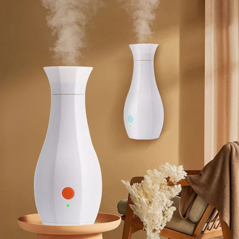 Perfume Machine - Two fragrance dispensers releasing mist, one on side table one wall-mounted, in cozy living room