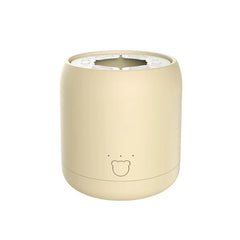 Milk Shaker - beige cylindrical device with bear face detail on white background
