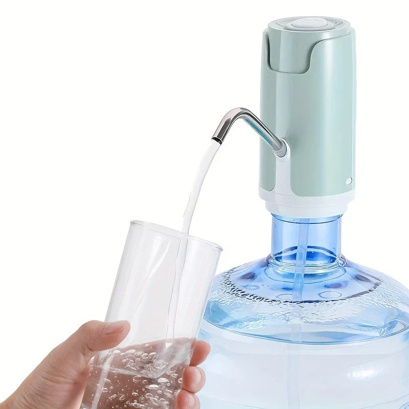Water Pump Dispenser - light green electric jug pump dispensing water into a clear glass from a blue gallon bottle