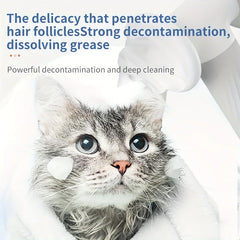 Automatic Foaming Pet Bath Brush Dispenser - Wet gray tabby cat wrapped in a white towel with foam on its cheeks, with grooming tool and deep cleaning text overlay