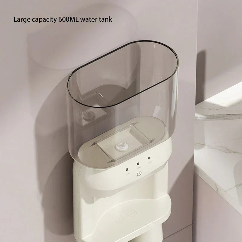 Top view of a mouthwash dispenser with a clear 600ML water tank and white control panel
