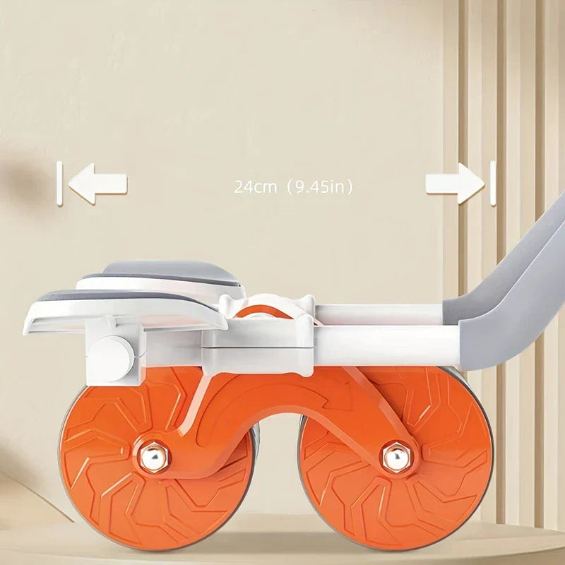 Ab Roller Wheel - Side view of orange dual-wheel ab roller with white frame, gray padding, and 24cm (9.45in) width marked by arrows.