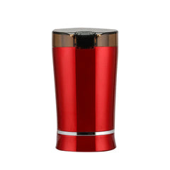 Coffee Grinding Machine - Red glossy electric grinder with black lid and silver base trim on white background
